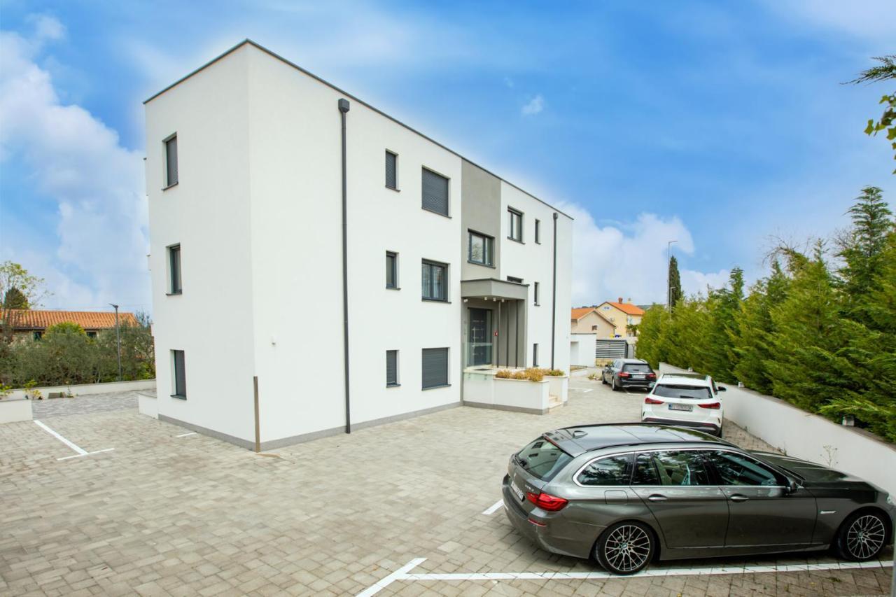 Apartment Muzini Malinska Buitenkant foto