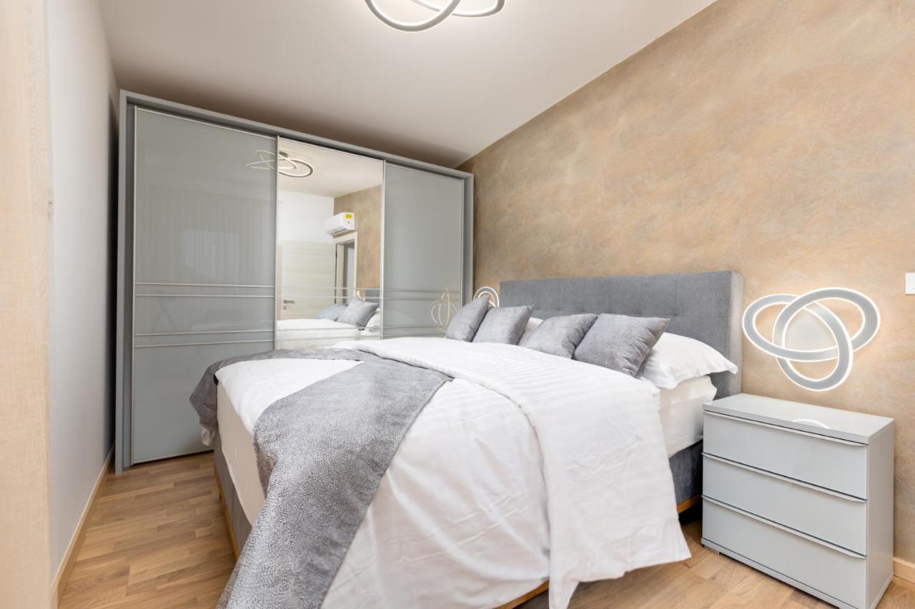 Apartment Muzini Malinska Buitenkant foto